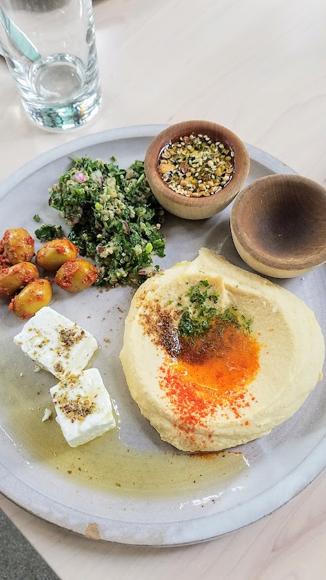 Tusk Weekend Happy Hour, served Saturday Sunday 2:30-5PM between brunch and dinner. A great way to slip in between the brunch and dinner rush. The Happy Mezze offers a little sampler each of hummus, olives, feta, tabbouleh, dukka, flatbread