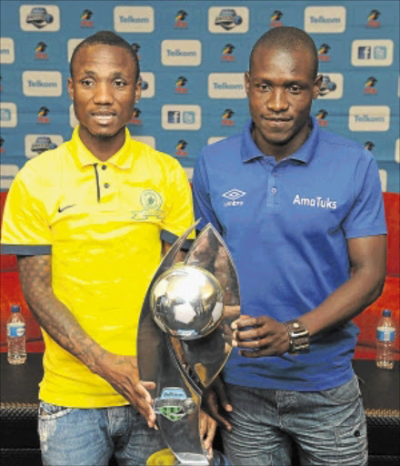 TOUGH MATCH: Sundowns' Teko Modise with AmaTuks' Teboho Monyai during a joint press conference at the PSL offices yesterday. Photo: Gallo Images