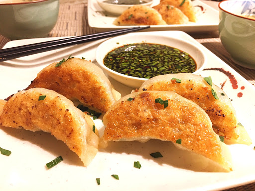 Dumplings filled with a spicy pork mixture