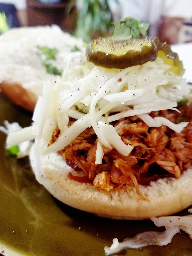 Shredded Bbq Chicken Sandwich Brioche Bun Tangy Slaw Sweet Pickles  Roasted Garlic Aioli Cilantro Green Onion - AMAZING!