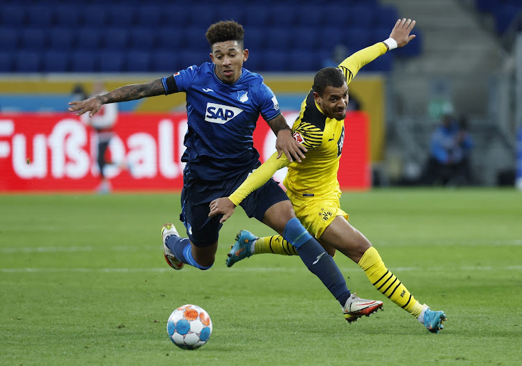 Hoffenheim's Chris Richards in action with Borussia Dortmund's Donyell Malen.