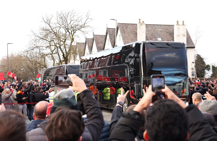 The Manchester United team bus arrives at Anfield ahead of their Premier League match against Liverpool on Sunday.