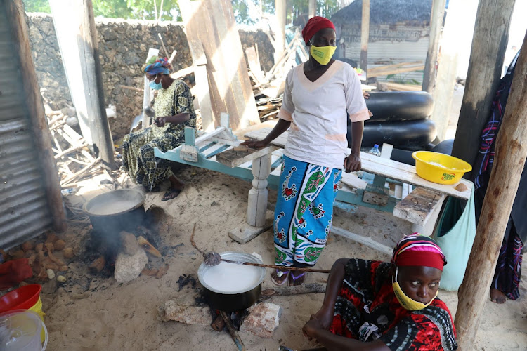 Baharini women beach operators making coconut oil at their place of work to help them earn a living after the tourism sector suffered due to the Covid-19 pandemic