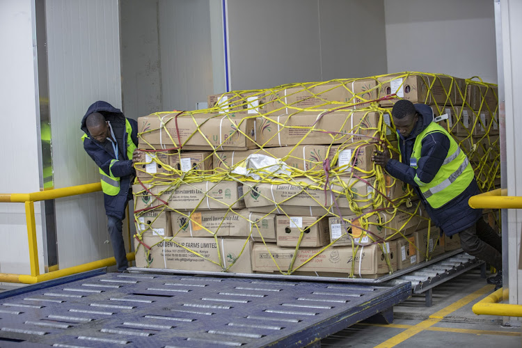 Perishable Movement Kenya Limited staff offloading products from the vacuum cooler