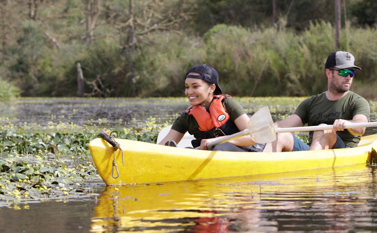 Actress and stand-up comic Pearl Thusi in a canoe with Quinton Smith on the Riviersonderend