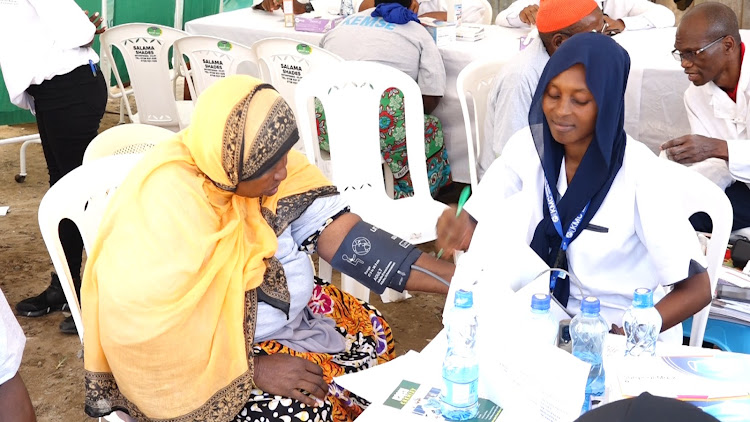 An elderly woman gets free medical services at Khairat medical centre in Kilifi