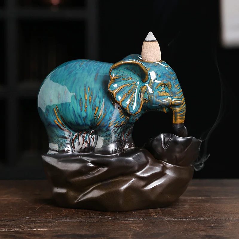 Brûleur d'encens éléphant fumé à refoulement de lotus en céramique Diffusez des arômes apaisants. Un objet décoratif zen pour votre intérieur.