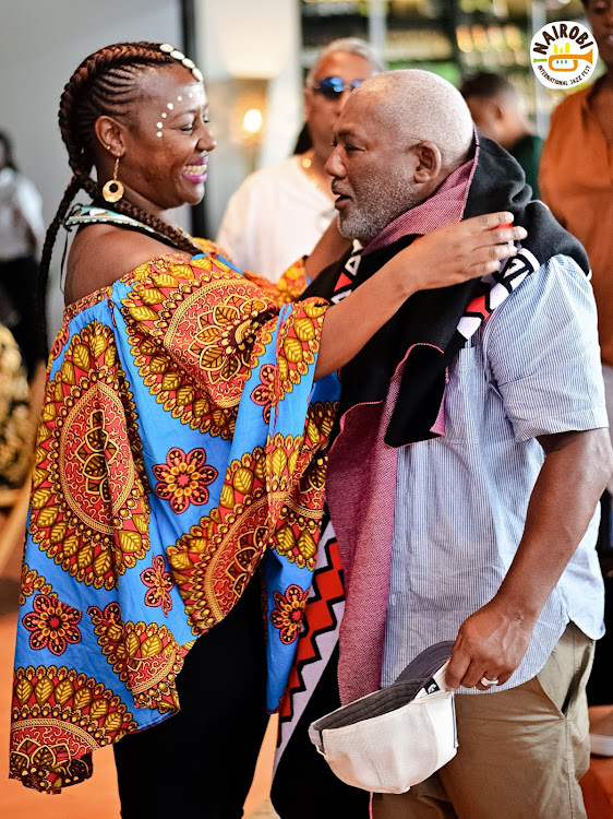 South African musician Jonathan Butler receiving gifts before his performance at the Nairobi International Jazz Festival on October 28, 202