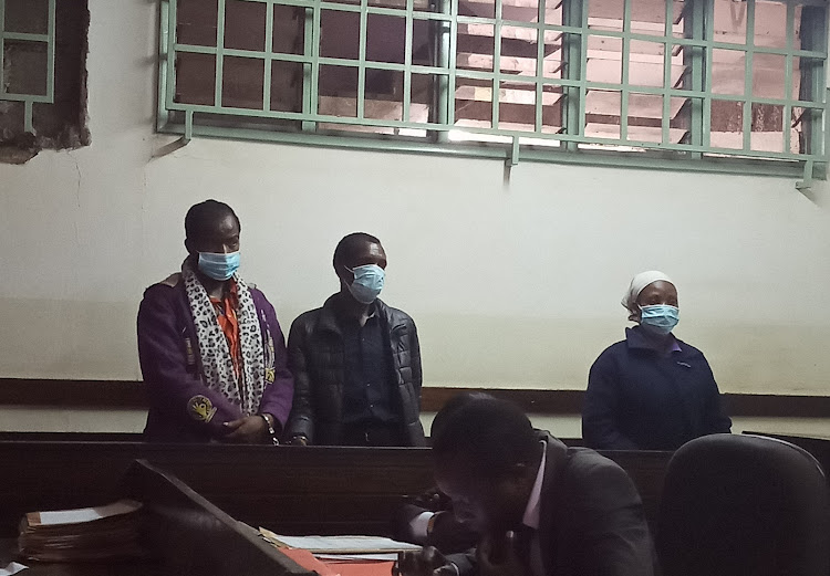 Kithuka Mbuta, Gladys Nakhumicha and Moctor Ndwasi in a Kibera court