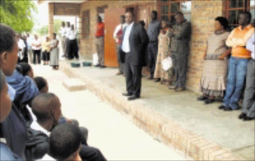 PEP TALK: Mopani municipality mayor Joshua Matlou, backed by a group of teachers, spraks to Grade 12 pupils at Rakgolokwana High School in Sekororo.Pic. SUPPLIED.