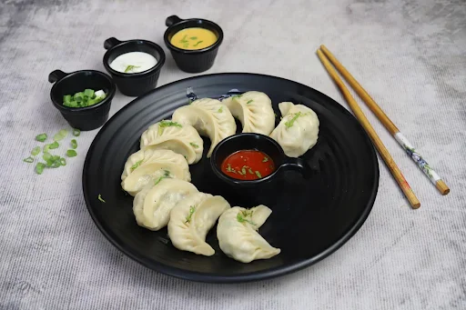 Gravy Paneer Momos [8 Pieces]