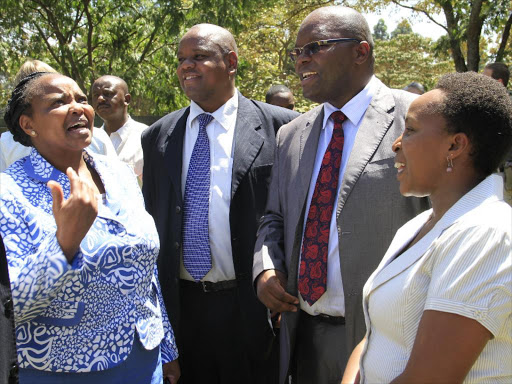 Deputy director, Physical planning in the ministry of lands and physical planning Theresia Munyua, KWS head of veterinary Francis Gakuya with senior director, biodiversity research and monitoring and head of land management Joycelyn Makena during the annual carnivore conference at KWS headquarter Nairobi, October 13, 2016. Photo/Monicah Mwangi