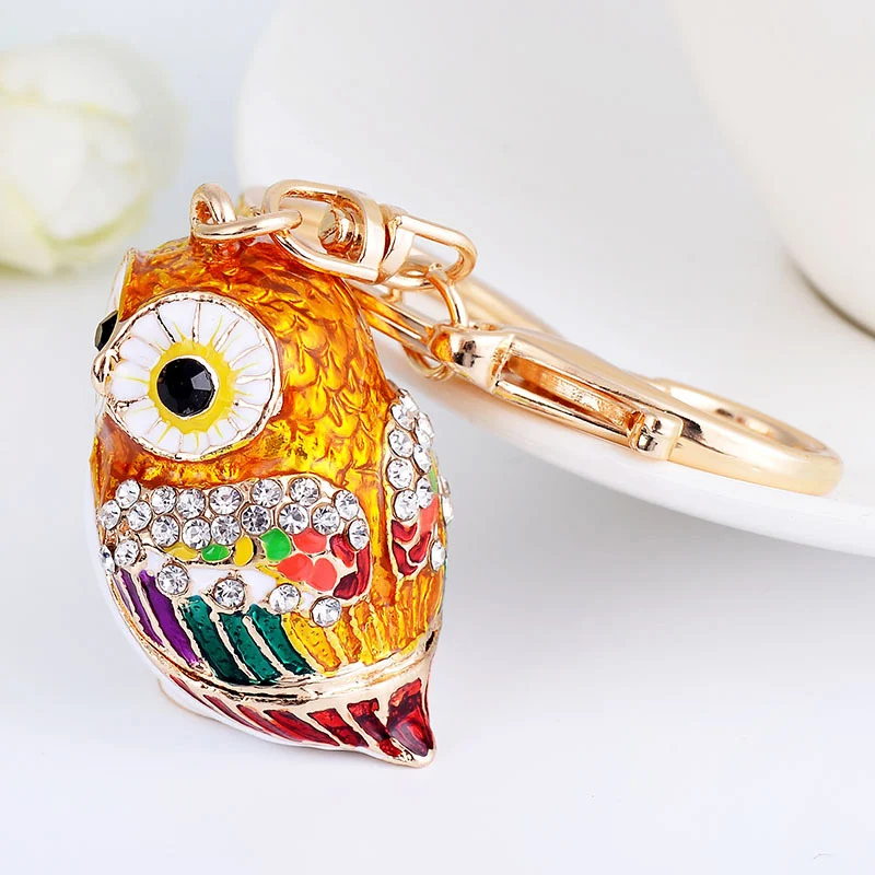 Chaveiro de carro de coruja criativo estilo europeu e americano, pingente de bolsa feminino, acessório de moda e personalidade.