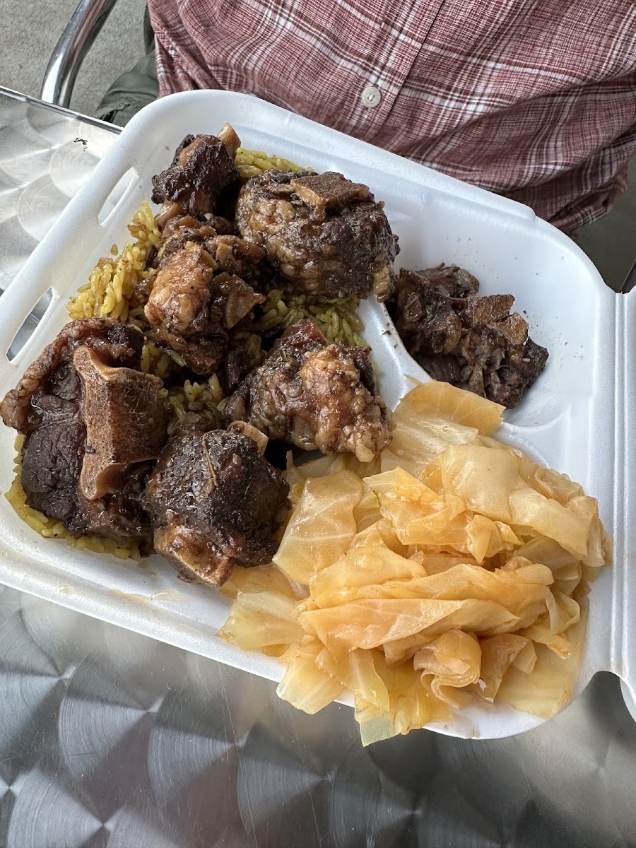 Ox Tails, yellow rice, cabbage