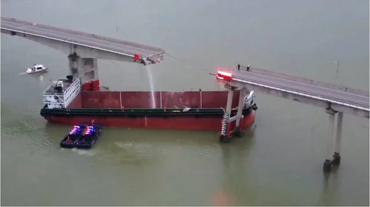 The barge was travelling from Foshan city to a southern district of Guangzhou when it crashed into the Lixinsha Bridge. Picture: CCTV