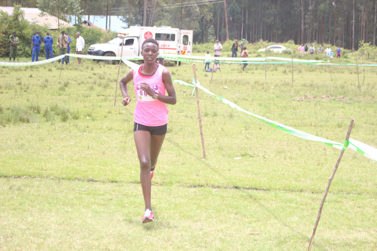 Beatrice Begi cruising to victory in the women's 10km race