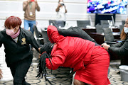 A female EFF MP dragged out of parliament by parliamentary security after she disrupted President Cyril Ramaphosa from delivering his budget speech.