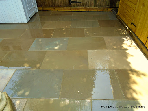 Matching paving to rest of garden and shed base constructed for new shed