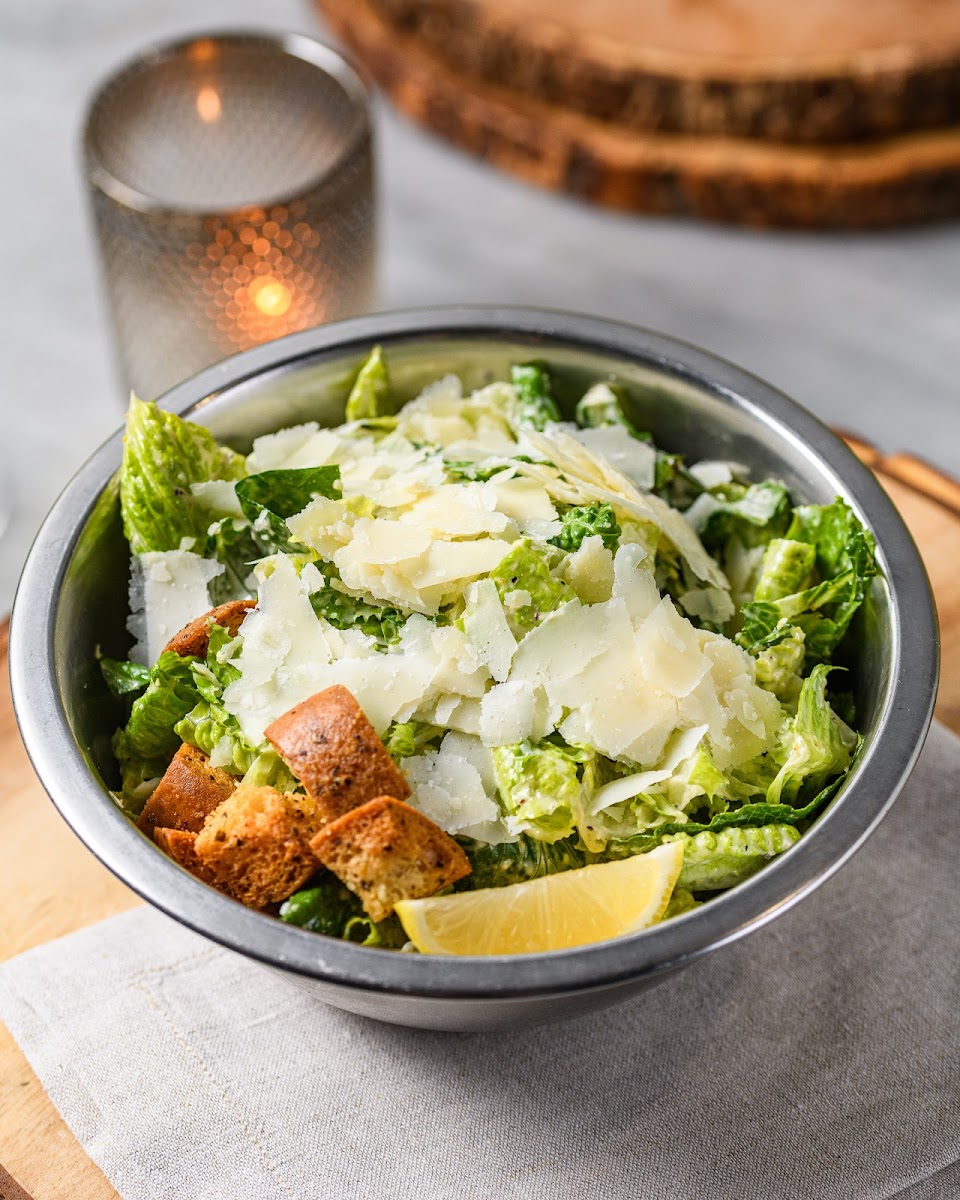 everyone’s favorite cheesy Caesar | 
chopped romaine | thick, classic, creamy dressing |
Grana Padano | buttery, garlic ciabatta croutons |
fresh lemon squeeze