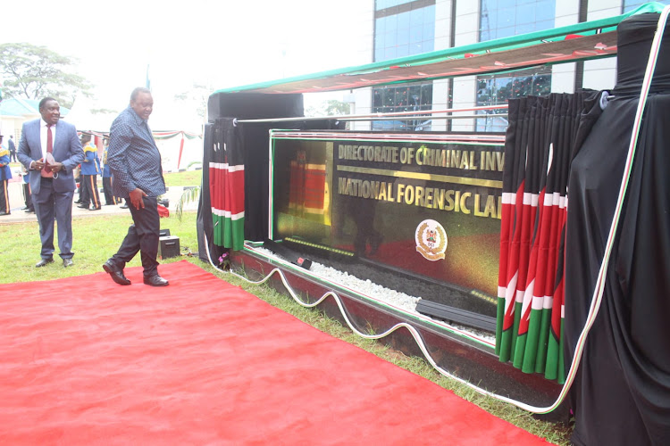 President Uhuru Kenyatta commissioning the DCI’s National Forensic Laboratory at the DCI headquarters June 13, 2022.