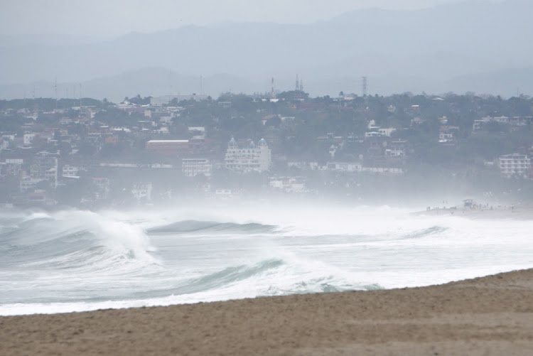 Waves are pictured on a beach as Hurricane Agatha barrels toward the southern coast of Mexico, in Puerto Escondido, Oaxaca state, Mexico, May 29, 2022.