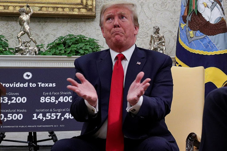 US President Donald Trump during a meeting about the response to the the coronavirus with Texas Governor Greg Abbott in the Oval Office at the White House in Washington, US, on May 7 2020.