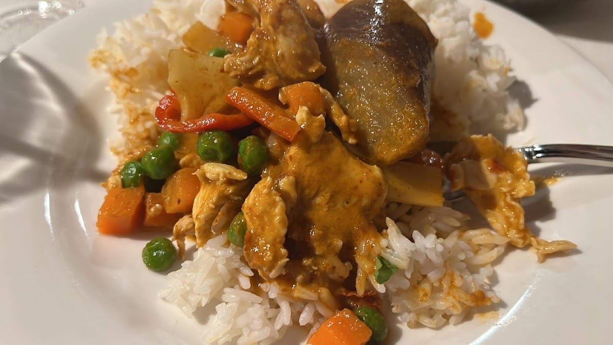 Red curry with chicken on jasmine rice