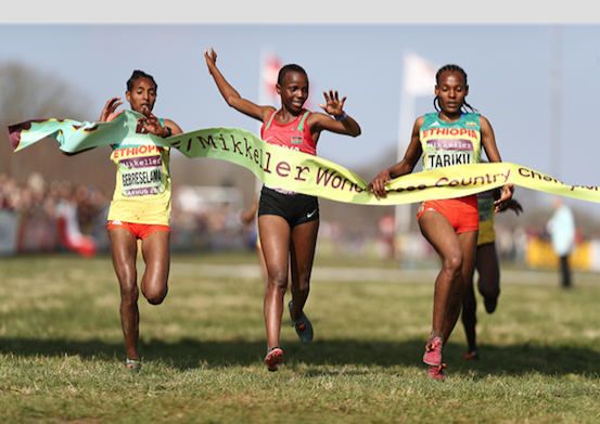 Beatrice Chebet (C) wins the 2019 U20 World Cross Country Championships title