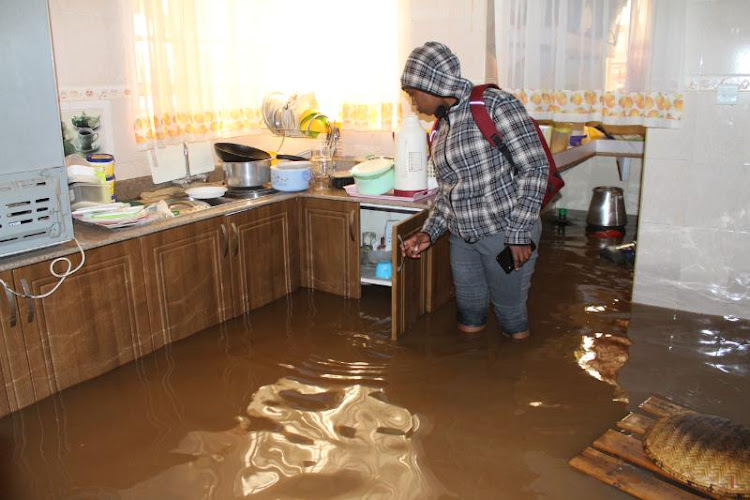 A woman inspects a sitting room at Varsityville Estate, Ruiru on December 5, 2019.