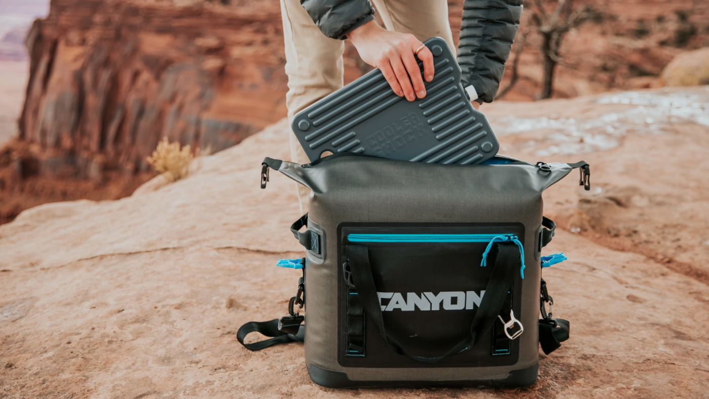 Adding an ice cooler block to a Canyon Coolers Nomad 20 Cooler in the desert.