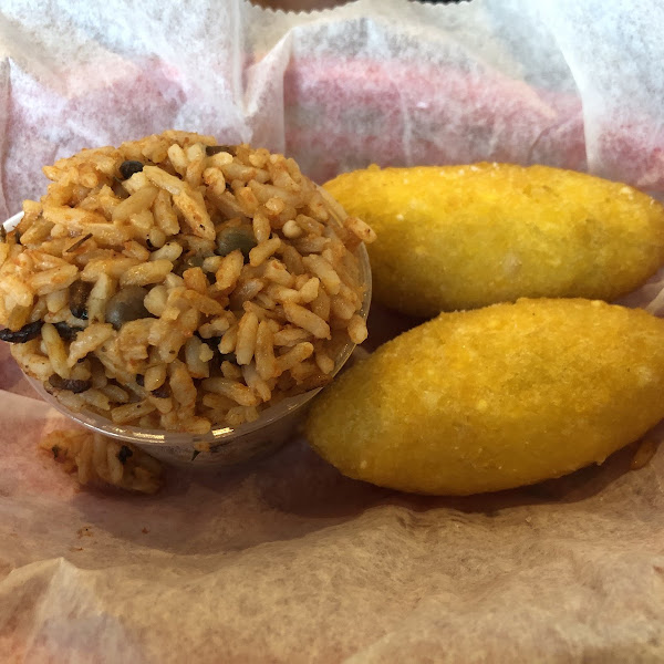 Two empanadas and side of rice