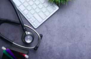 Stethoscope on a computer keyboard