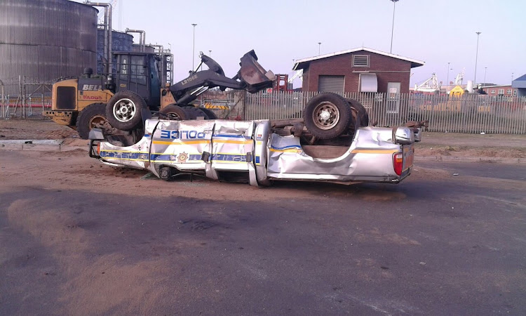 Numsa members caused chaos in early May when angry port workers used front-end loaders to flip over police vehicles. File photo.