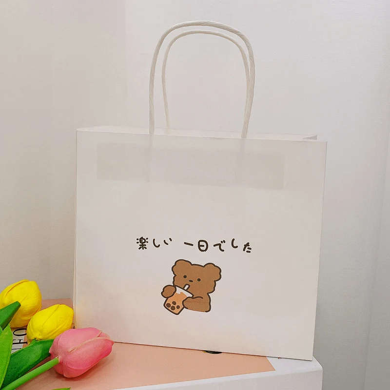 Schattige, prachtige Koreaanse stijl cartoon papieren tote bag. Perfect voor cadeaus, winkelen en dagelijks gebruik. Een onweerstaanbaar accessoire.