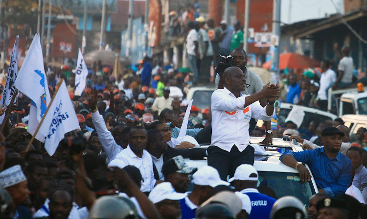 Congolese joint opposition presidential candidate Martin Fayulu waves to supporters as he campaigns in Goma, North Kivu, in the DRC, on December 6 2018.