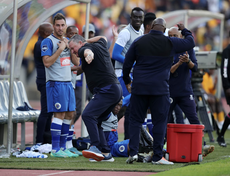 SuperSport United coach Gavin Hunt celebrates after the 1-0 win over Kiazer Chiefs at Royal Bafokeng Stadium in Rustenburg.