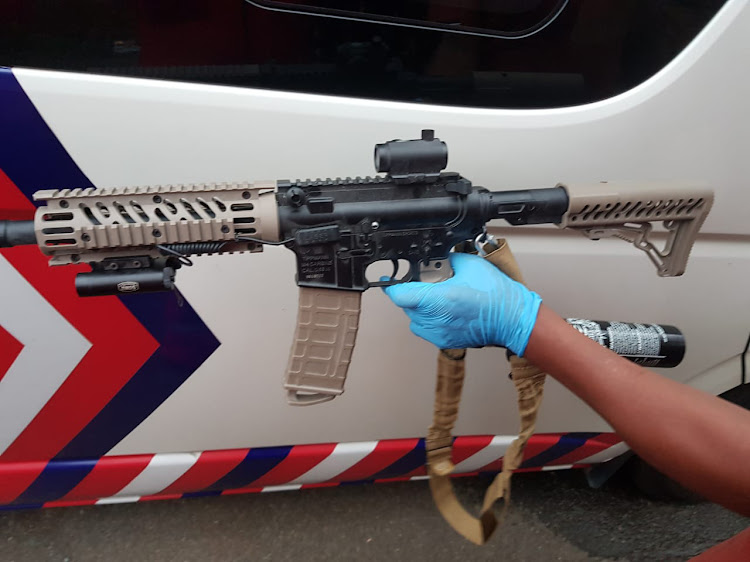 The paintball gun used to shoot a paramedic who arrived to treat a patient with a knife embedded in his stomach.