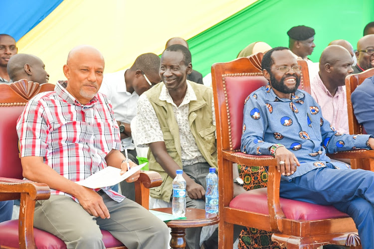 EACC Chief executive officer Twalib Mbarak and Kisumu governor Prof Anyan'g Nyong'o at a function in Kibuye Market on Wednesday
