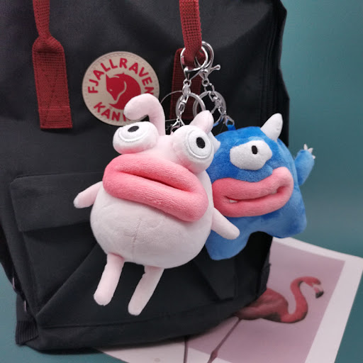 Title 2, Sausage pendant and ugly cute blue bunny plush ...