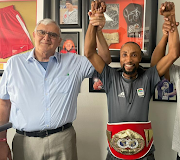 Andre de Vries, left, with boxer Bongani Mahlangu. 