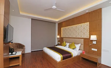 Capital O Premium Hotel Star Suites photo 