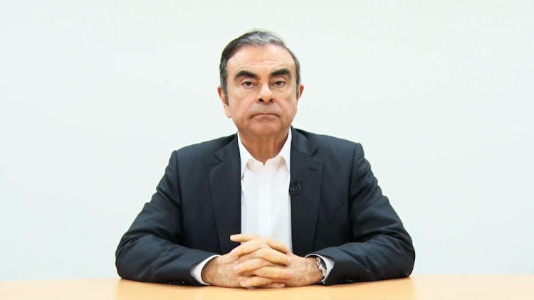 Nissan's former chairperson, Carlos Ghosn, speaking before he was re-arrested in Tokyo, Japan.