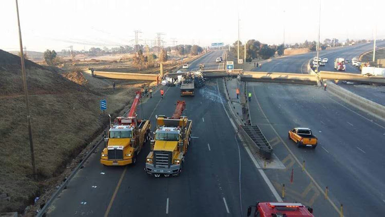 Demolition experts on site to dismantle the remainder of the bridge.