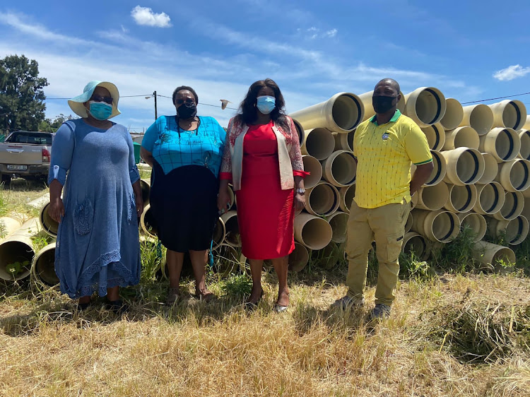 OR Tambo water and sanitation portfolio head Nonkoliso Ngqongwa, KSD municipal rural economic development portfolio head Nontyatyambo Gcingca, OR Tambo district mayor Thokozile Sokanyile and KSD ward 1 councillor Jongikhaya Mvoko during the handing over of a contract for the R23m Ngangelizwe sewer upgrade project on Thursday.