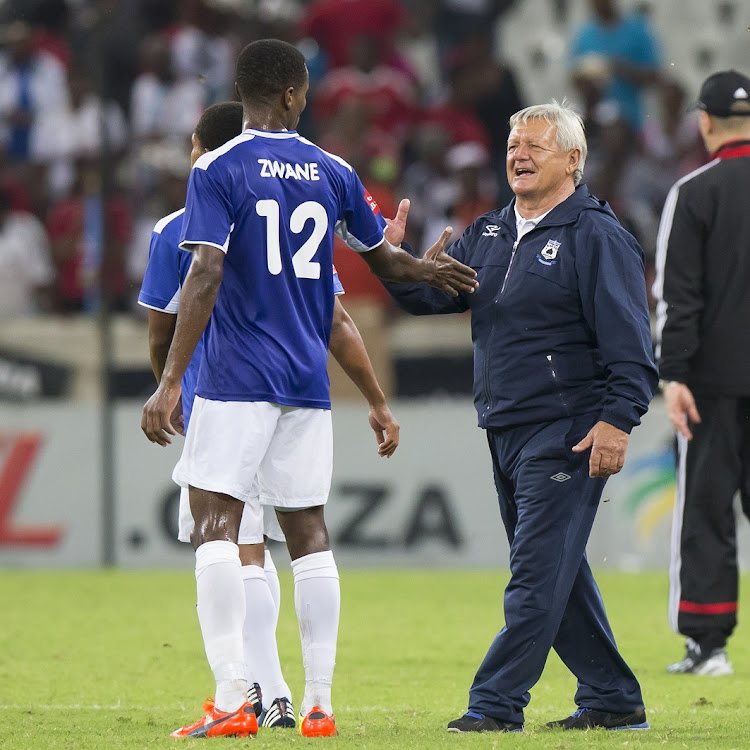 Clive Barker congratulates his player, Themba Zwane, whose career he had a profound influence over, as coach of Mpumlanga Black Aces after an Absa Premiership win against Orlando Pirates at Mbombela Stadium in March 2014.