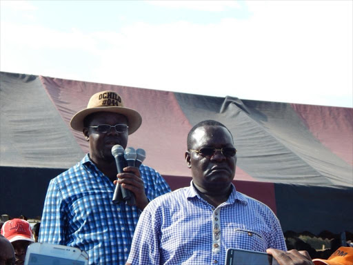 A file photo of politicians Ochilo Ayacko and Edick Anyanga at Kibuon center in Nyatike constituency, Migori county. /MANUEL ODENY