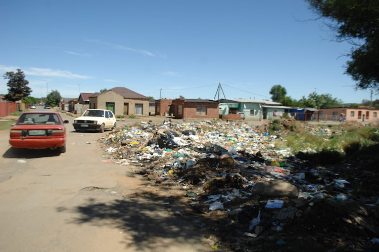 The backyard of the biggest public hospital in the Free State is a dumping site.