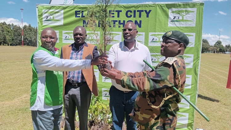 L-R: Moses Tanui, AK Uasin Gishu chairman Joseph Boi, race chairman Andrew Chelogoi and Anthony Musyoka of Kenya Forest Service