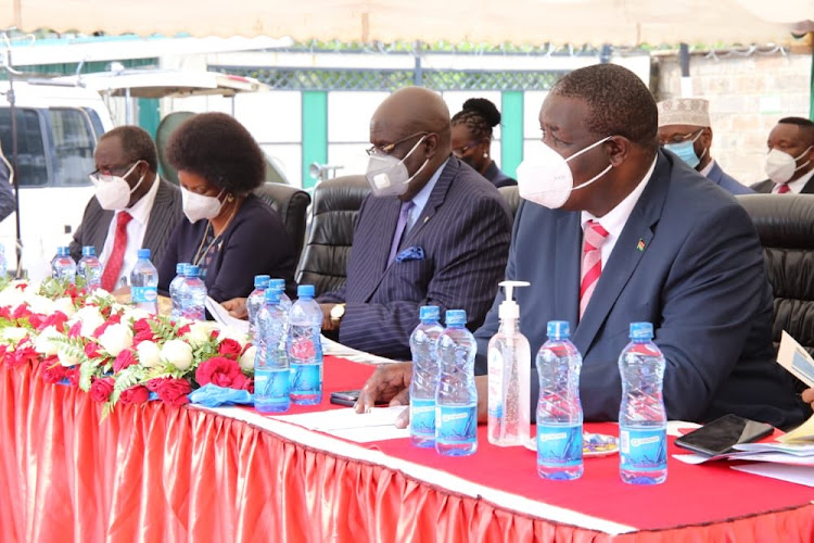 TSC CEO Nancy Macharia, Education CS George Magoha and PS Julias Jwan during release of KCSE results on May 10, 2021.