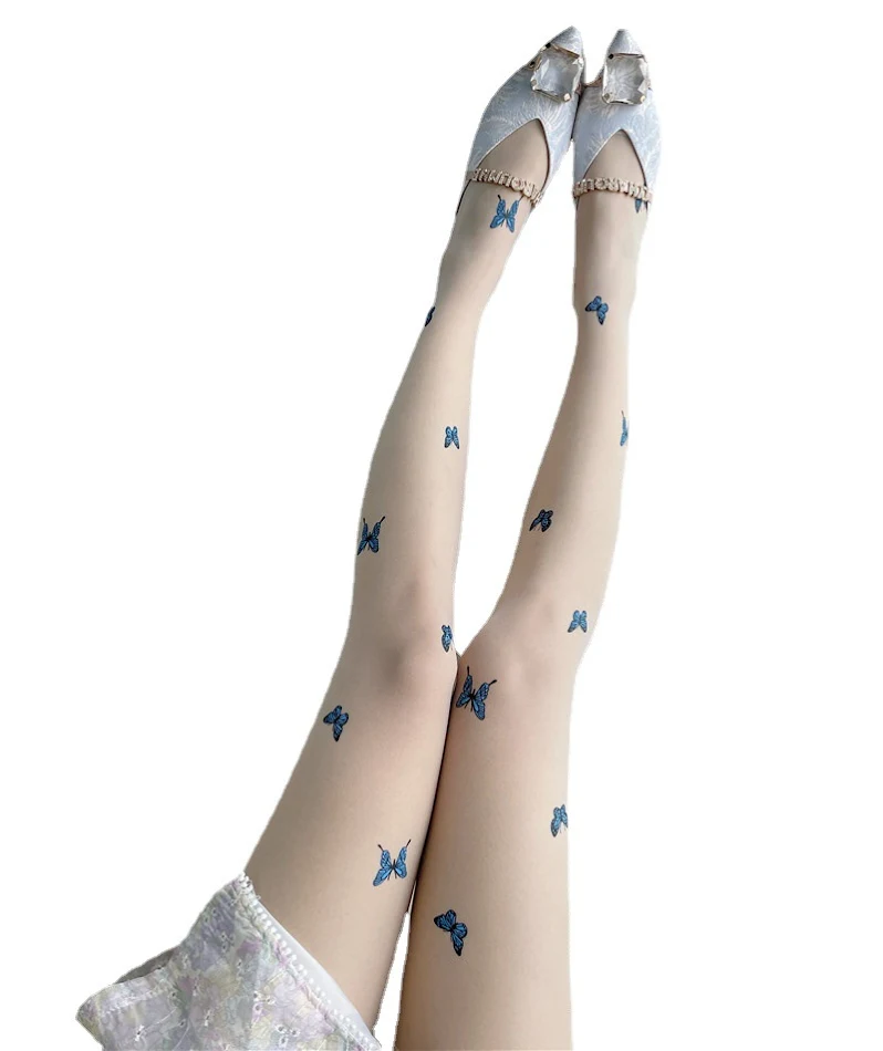 Collants de fond de teint à imprimé papillon bleu, chauds et élégants, parfaits pour être portés sous des jupes ou des robes.